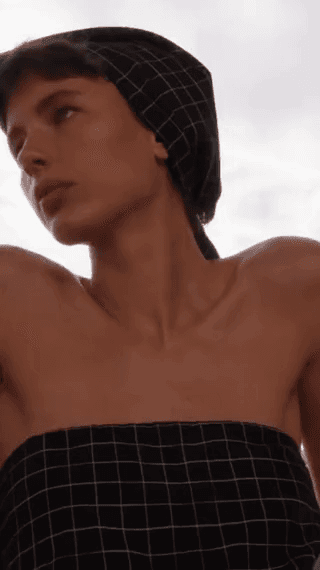 Vince: a model in a black grid headscarf and strapless top